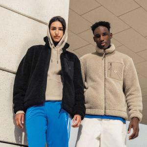 Two people wearing Recycled Unisex Sherpa Jacket