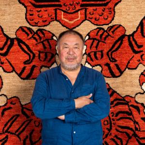 Ai Weiwei and his exclusive rug creation for Tomorrow’s Tigers 2022, entitled Tyger.
