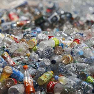 Plastic bottles at landfill site - South Jakarta  - © WWF / Yunaidi Joepoet
