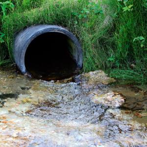 Outflow pipe from watercress production facility, Hampshire, UK