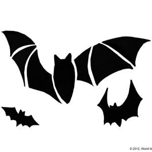 A black pumpkin stencil of bats 
