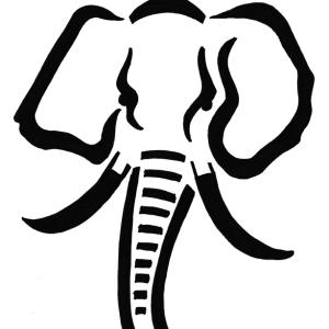 A black pumpkin stencil of an elephant