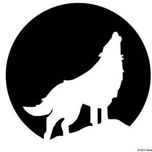 A black pumpkin stencil of a wolf